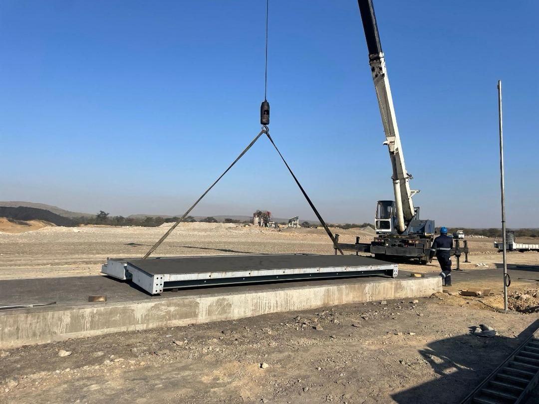 Deck section being set into position by crane